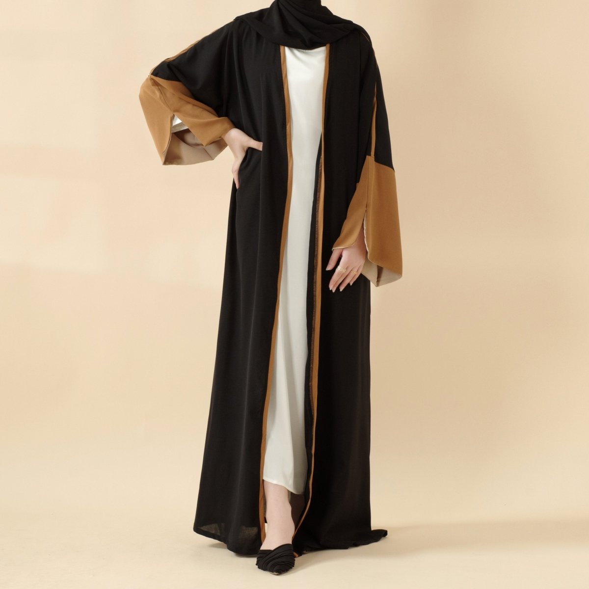 The Modern Contrast-Trim Slit Sleeves Open Abaya: A Fusion of Faith, Fashion, and Cultural Expression May 2025 - Mariam's Collection