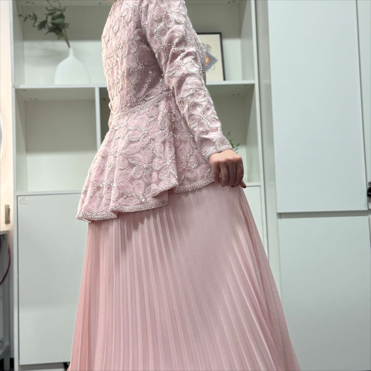 Lattice vine pearl bead embroidery detail along front opening and hem of jacket