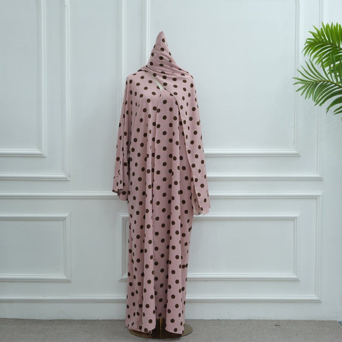 Back hem detail of polka dot batwing abaya cardigan