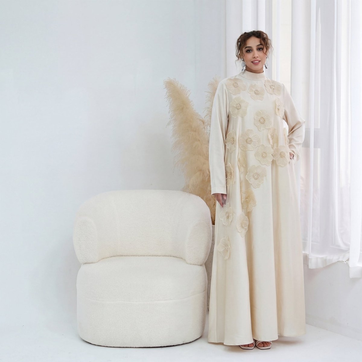 Model wearing luxury beaded formal maxi dress at formal occasion styling