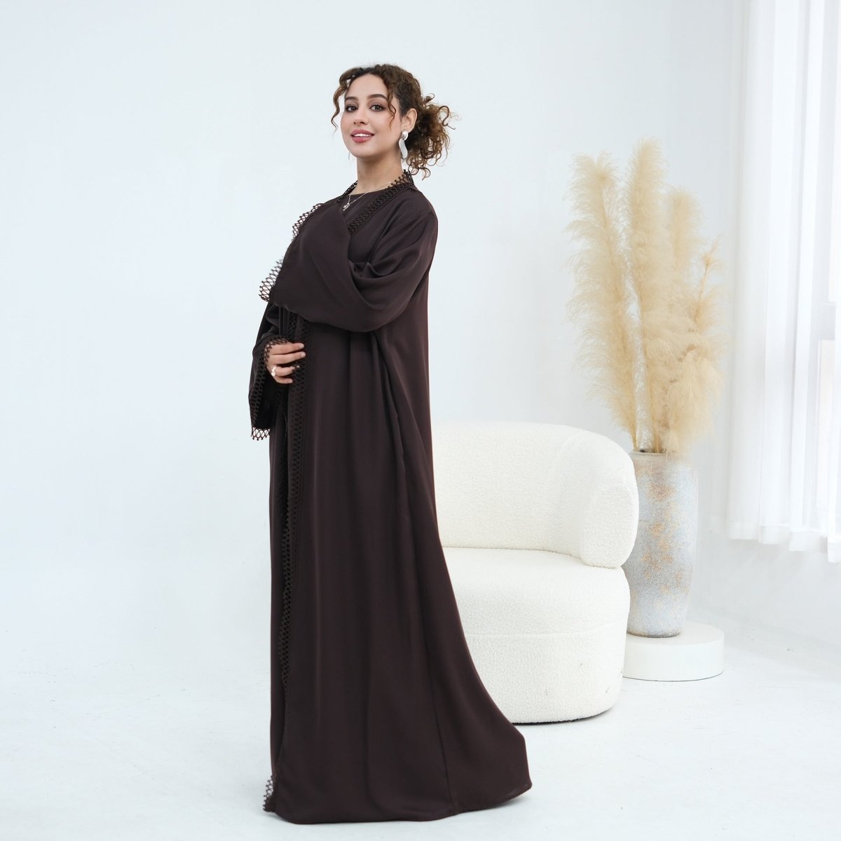 Abaya set styled for formal occasion showing full silhouette