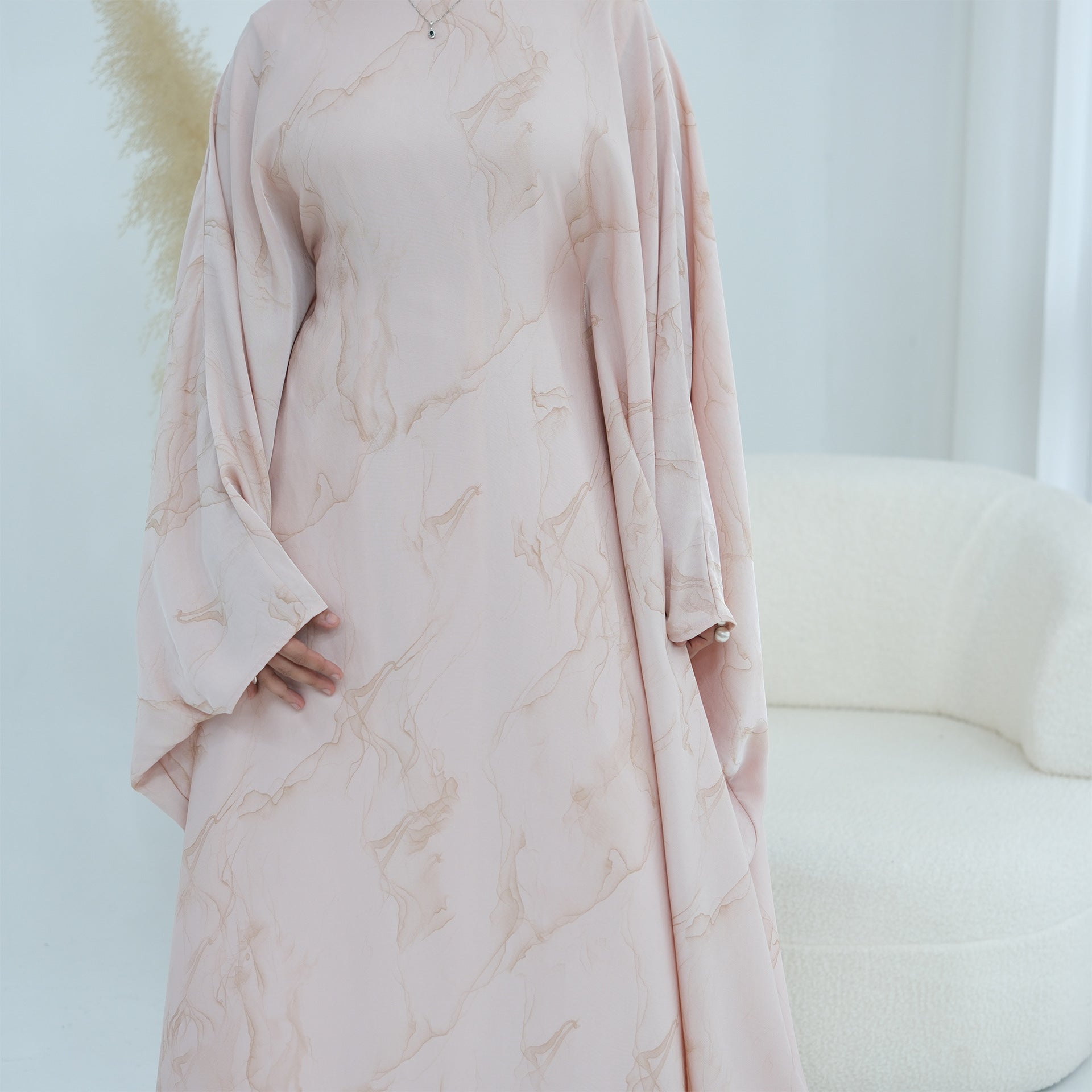 Soft luminous fabric drape of gold print batwing maxi dress
