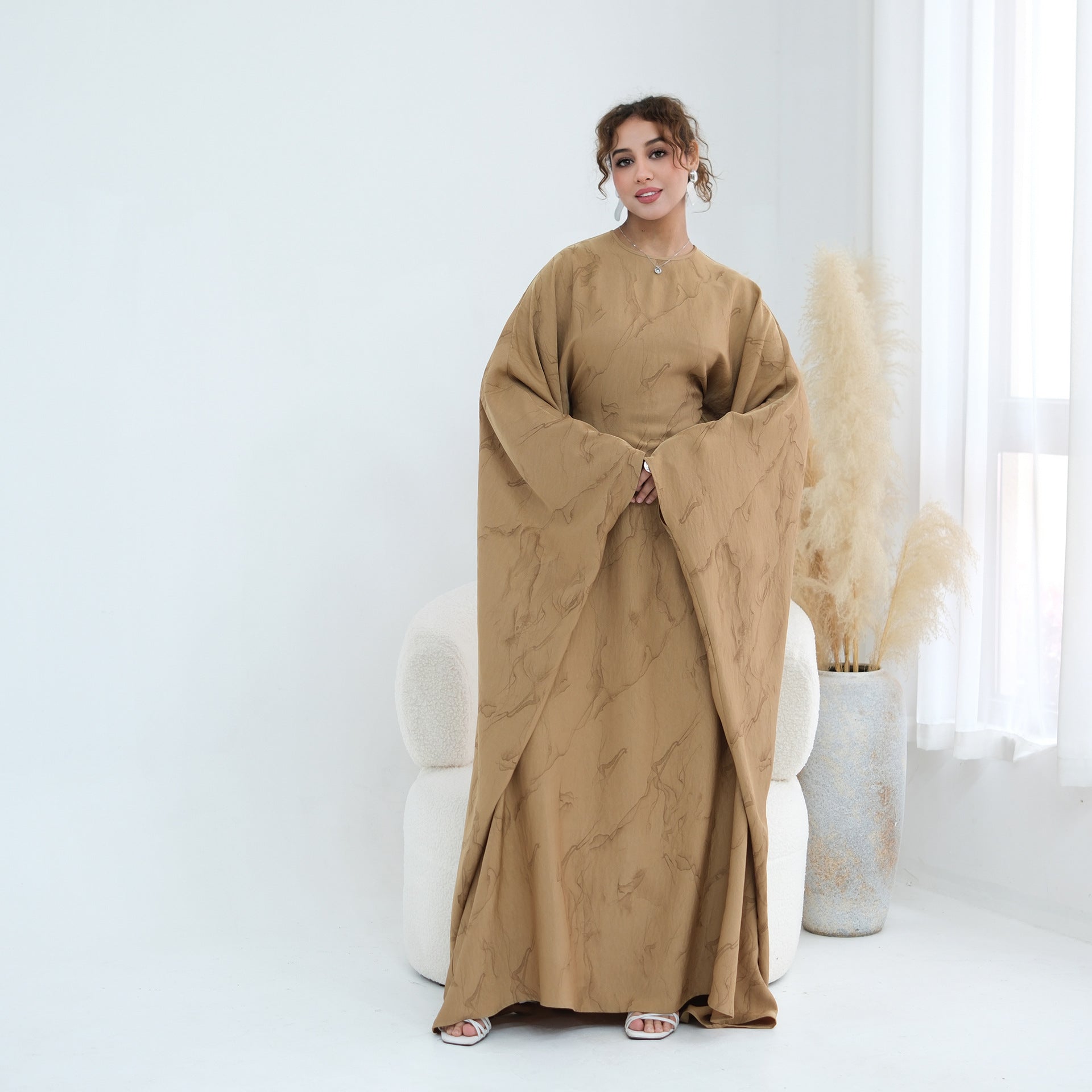 Open cuff sleeve detail on gold marble print modest maxi dress