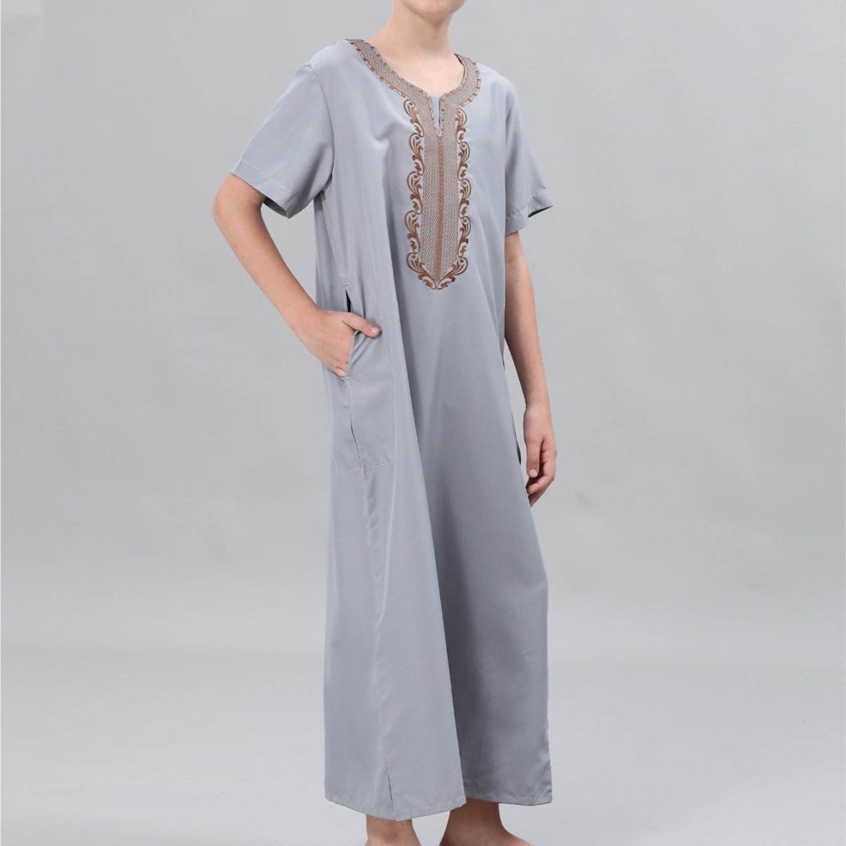 Kids' thobe colourway selection: white, cream, gray options