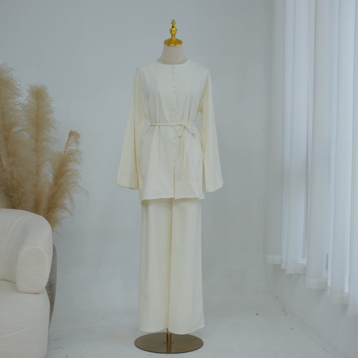 Wide-leg trouser detail with elasticated waistband and deep side pockets