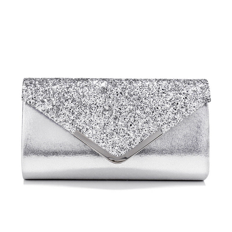 Close-up of high-shine glitter fabric on envelope clutch