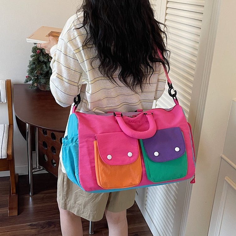 Top zipper closure detail on lightweight carry-on duffel bag