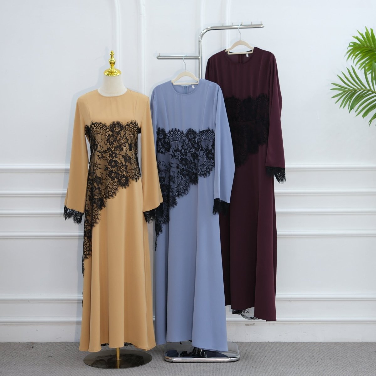 Back view showing full sheer black lace skirt panel over lined base