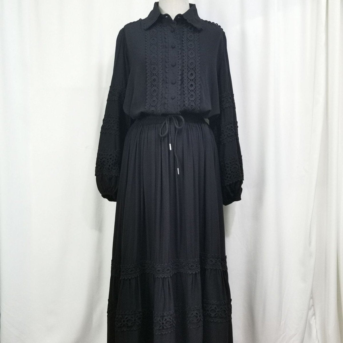 Victorian inspired modest ensemble with romantic lace and tiered layers
