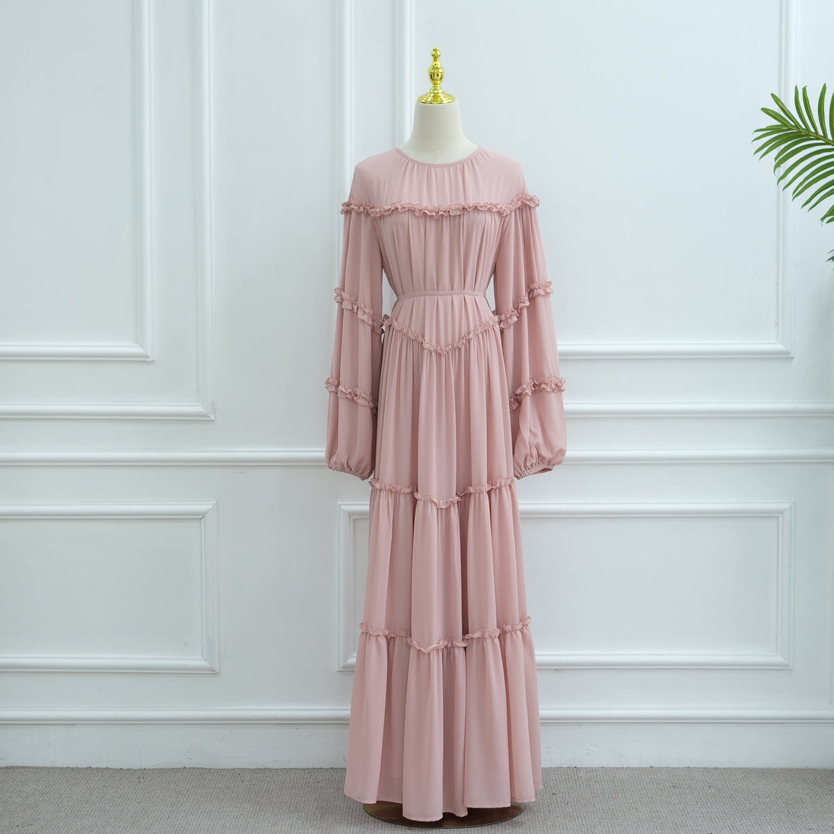 Side profile of double-layer cake skirt showing flowing tiered panels