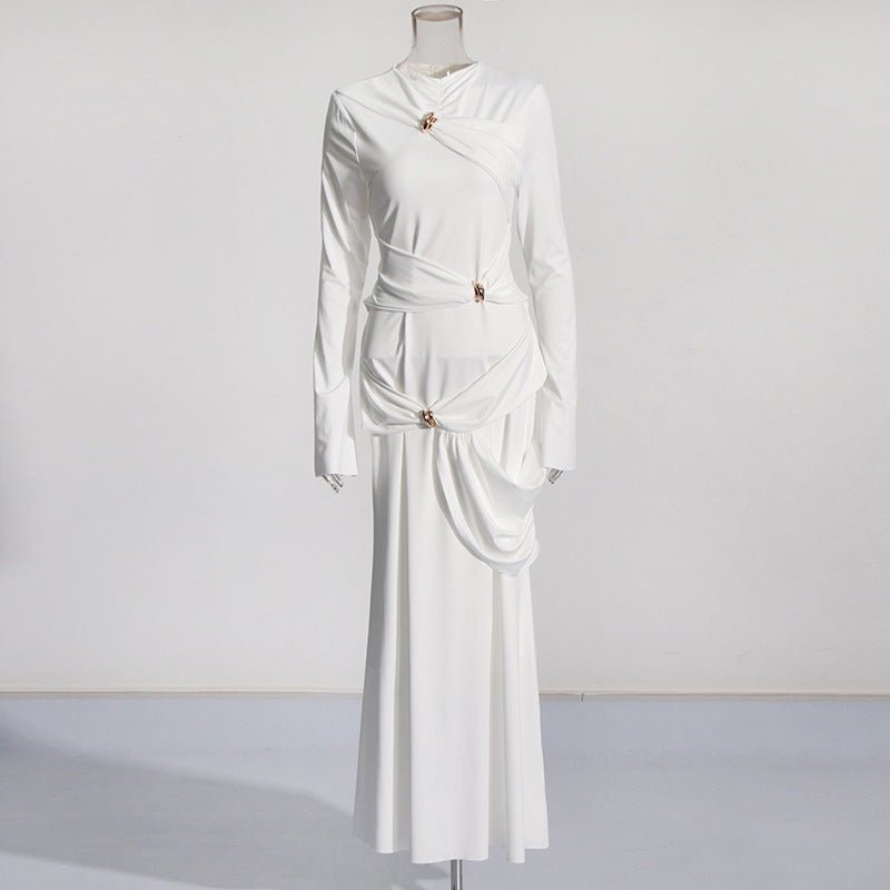 Three-quarter view of the sculptural draped abaya silhouette