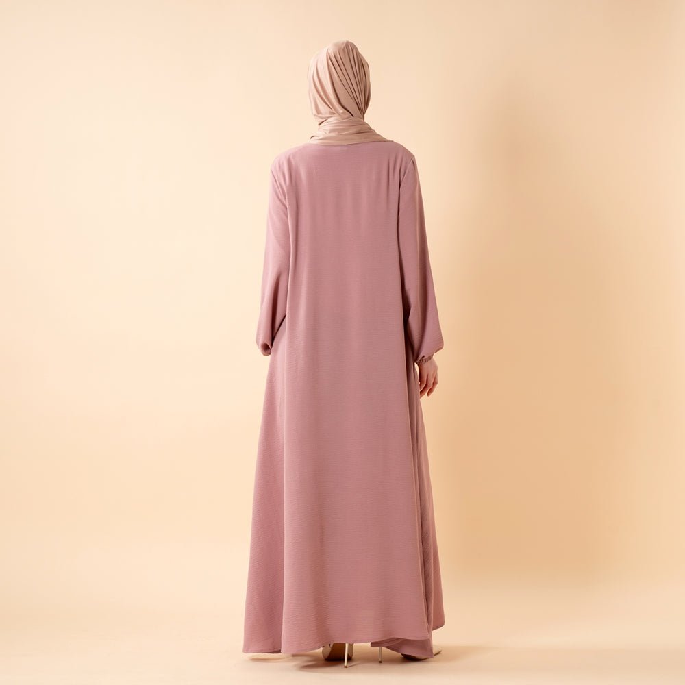 Essential Flow abaya in forest olive with effortless A-line silhouette