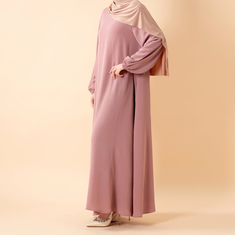 Crepe maxi dress with practical pockets for daily modest wear
