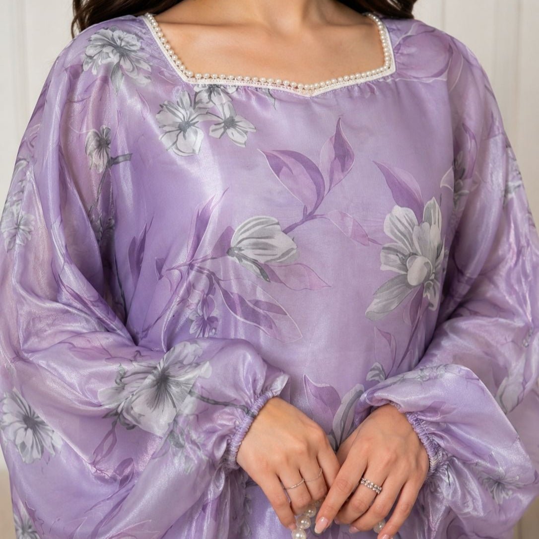 Full-length view of magnolia and lily print organza abaya dress