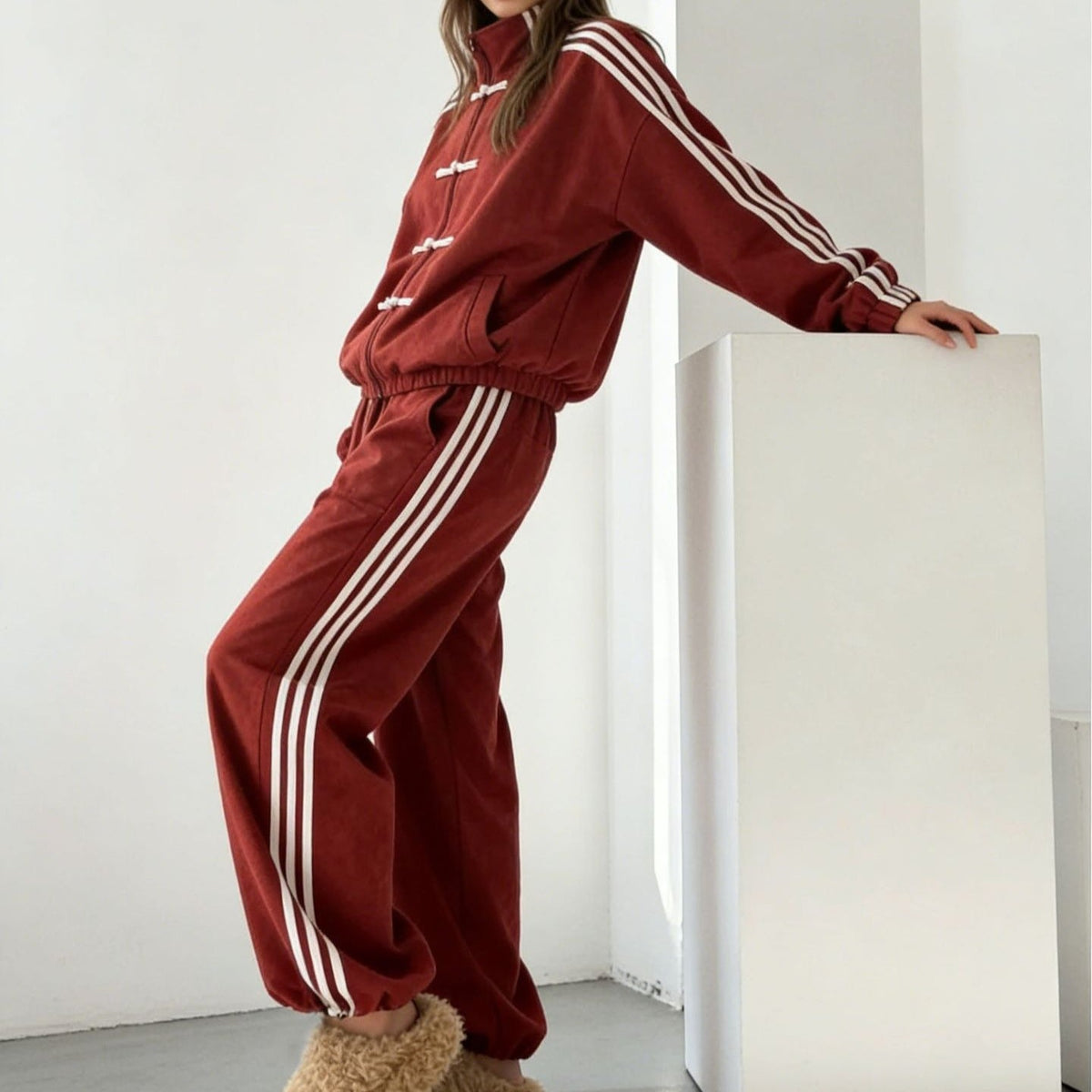 Modest Mandarin collar tracksuit worn for travel