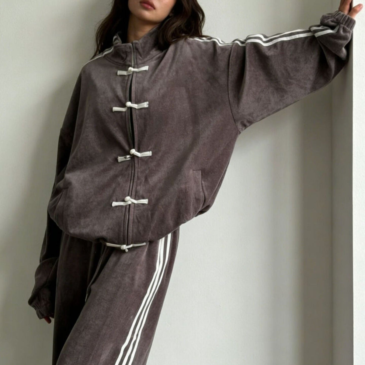 Pocket detail on the wide-leg track trousers