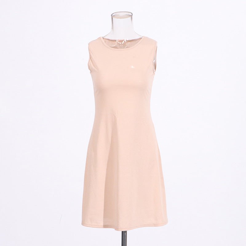 White geometric lace dress with fitted bodice and flowing skirt