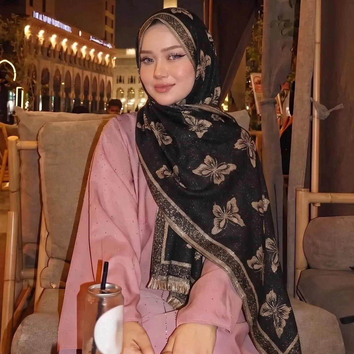Full-length view of tassel maxi hijab draped over shoulders