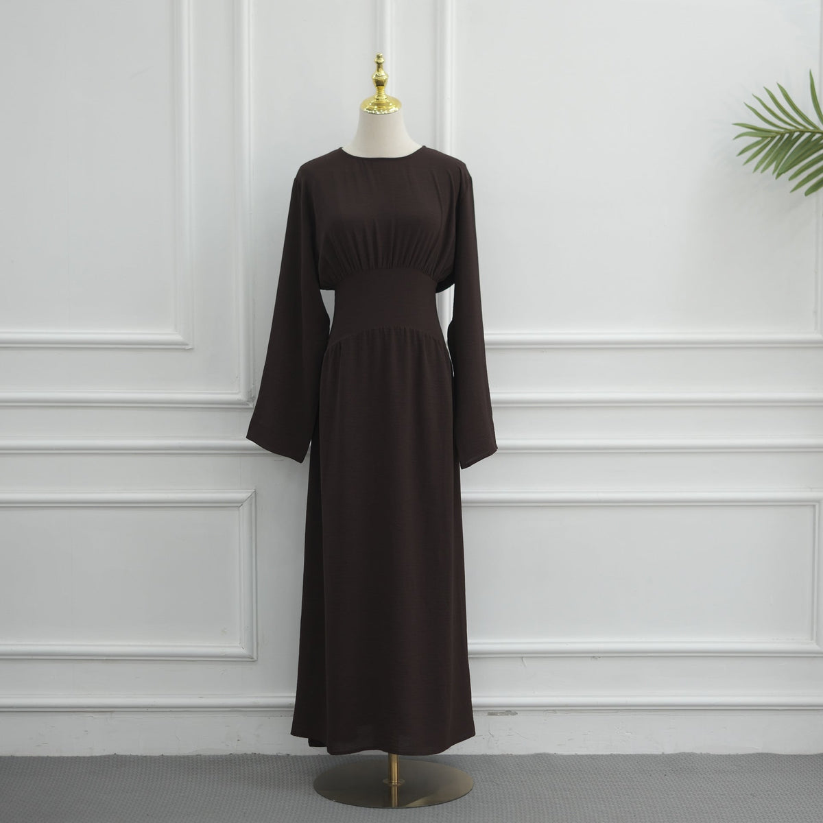 Round neckline with short centre-front slit detail