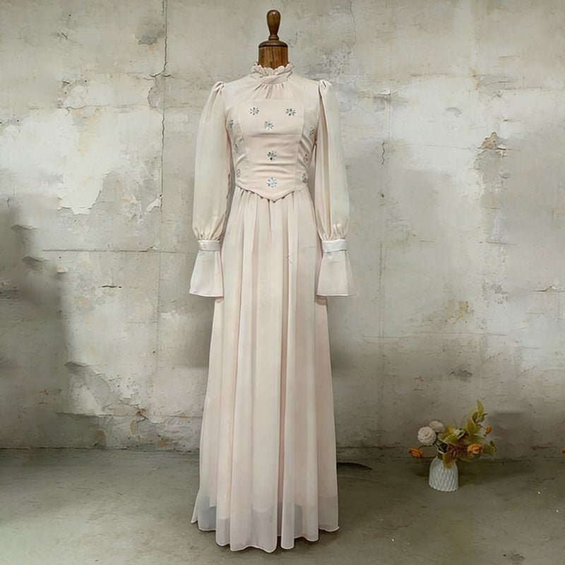 Crystal embellished evening gown with elegant floor-length silhouette