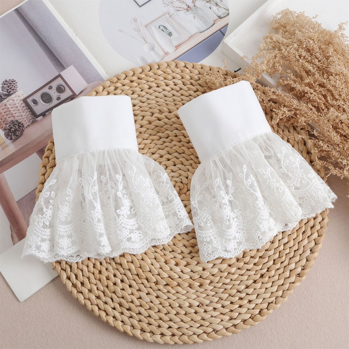 Lace bell cuff sleeves in white with dramatic flared silhouette