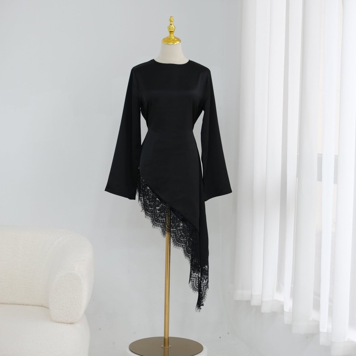 Fitted silhouette of contrast panel satin top on model