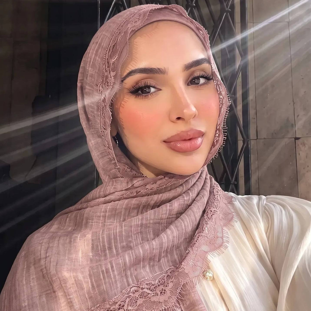 Dusty rose solid colour hijab shown flat