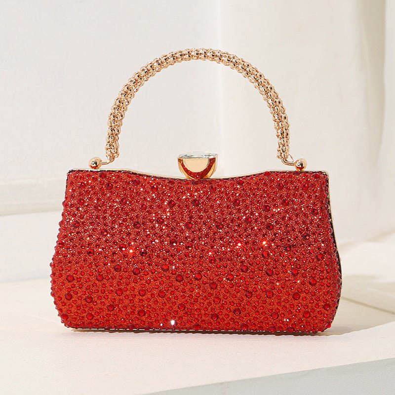 Top-handle view of sparkling rhinestone clutch bag with clasp closure