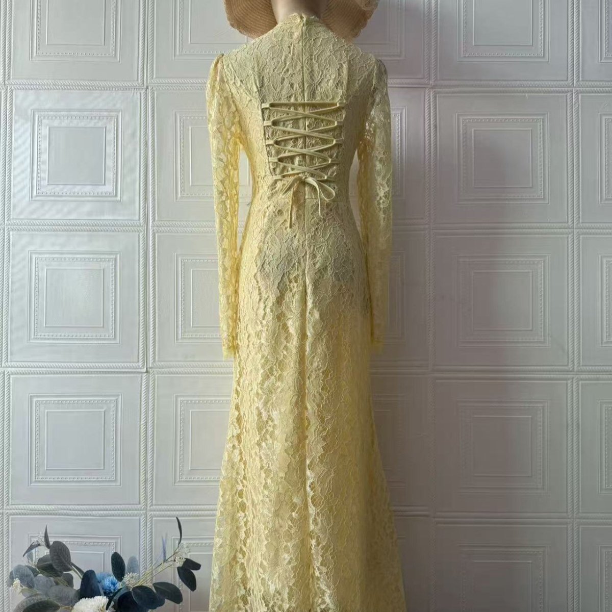 High mock neckline and sheer lace yoke detail on bell sleeve dress