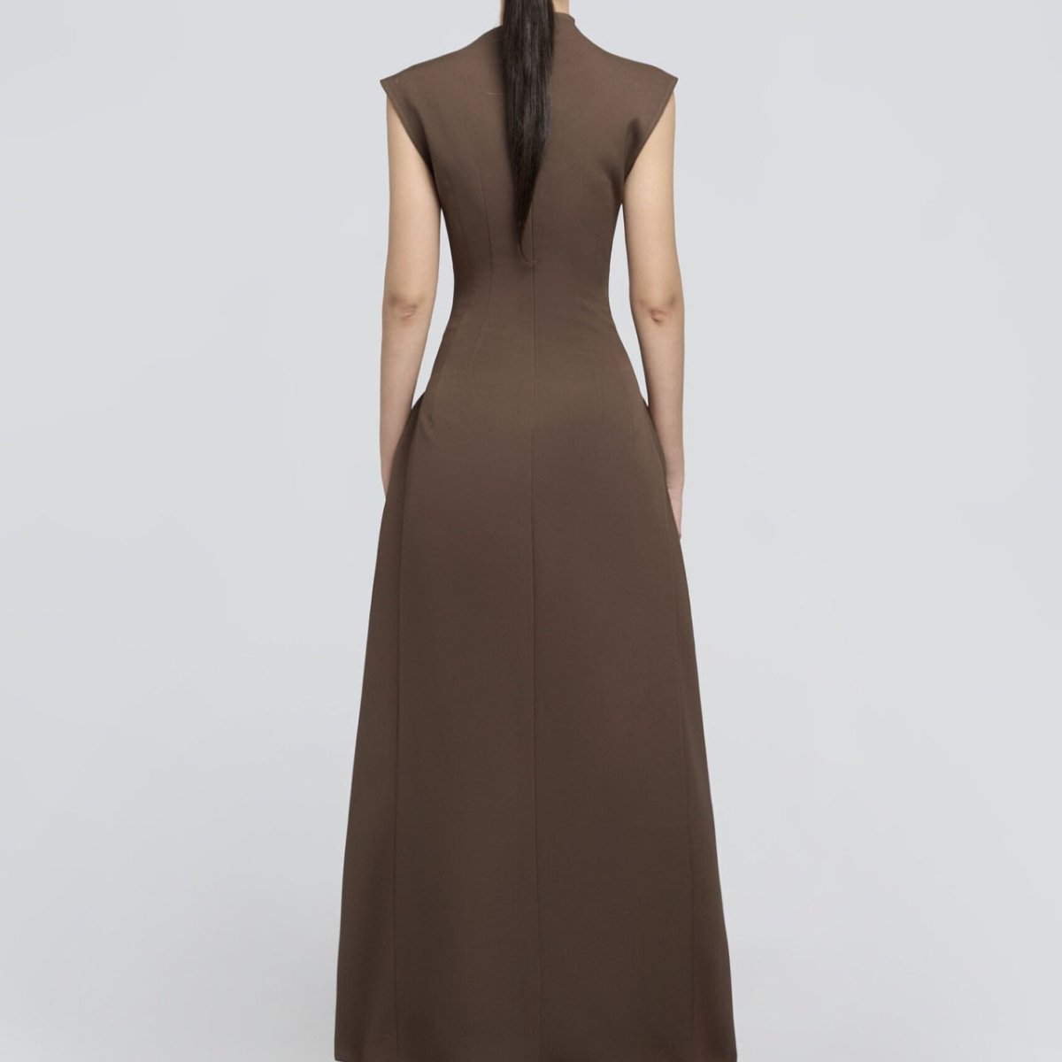 Sleeveless architectural maxi dress with sophisticated clean lines