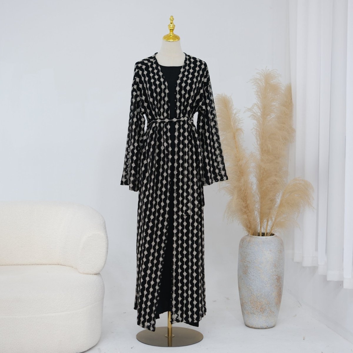 Openwork lace abaya layering over inner modest dress