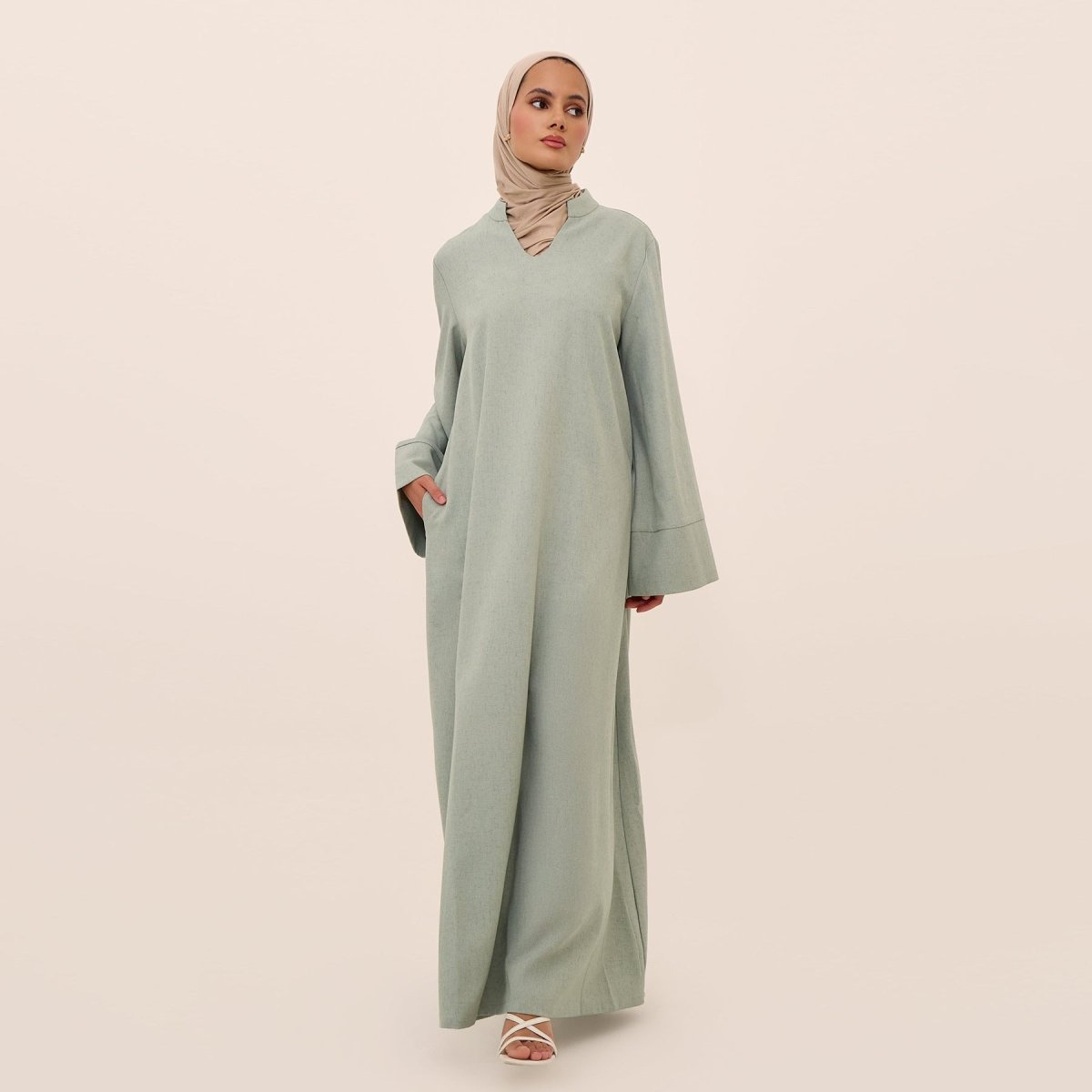 Oversized V - Neck Abaya with Pockets | Solid Color Maxi Dress with Wide Cuffs(MA331) - Mariam's Collection