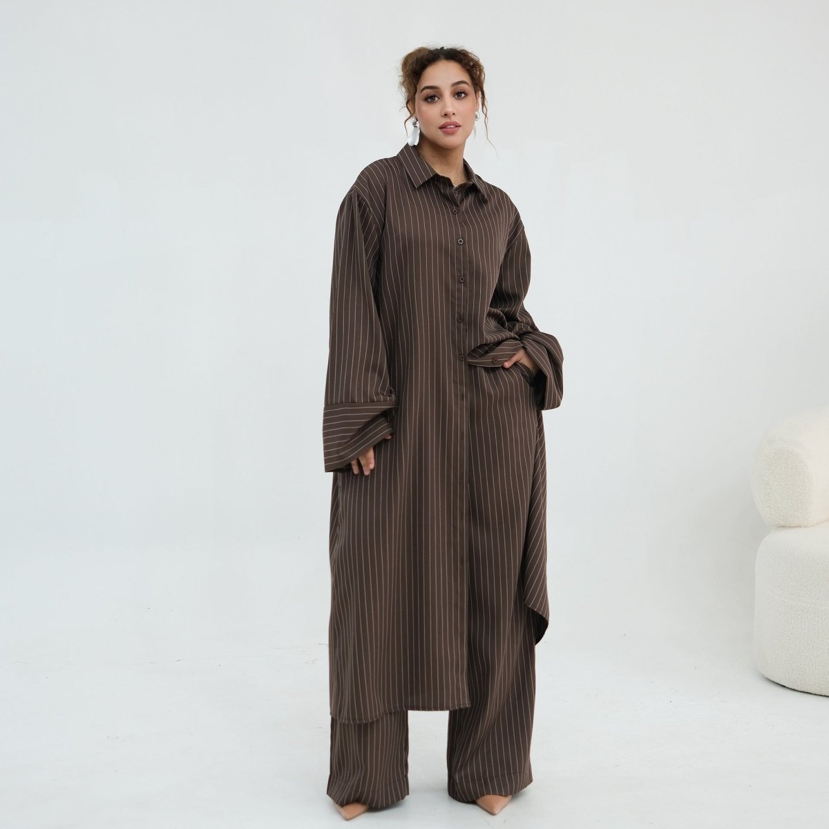 Floor-length trouser hem showing full coverage of the wide-leg cut