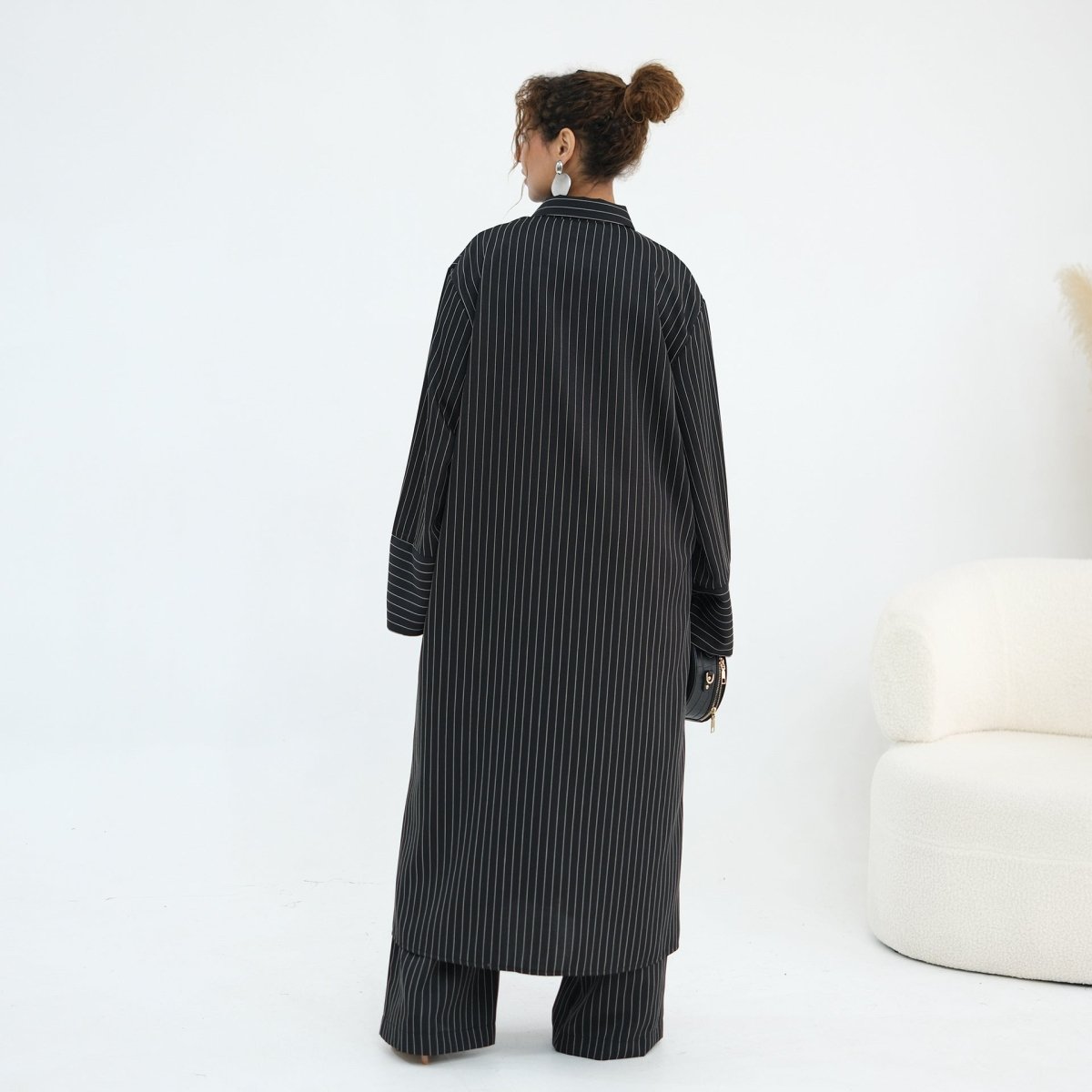 Longline shirt coverage shown from collar to below-knee hem