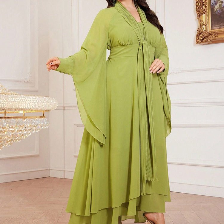 Full-length side view of flowing chiffon ruffle maxi dress in lime green