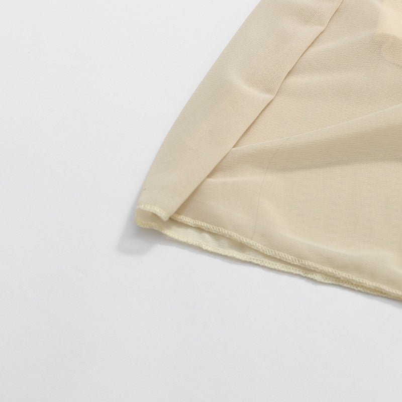 Ruched bodice dress shown in natural light highlighting fabric texture