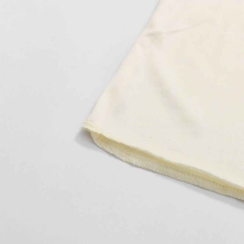Three-quarter view of lantern sleeve dress showing sleeve volume