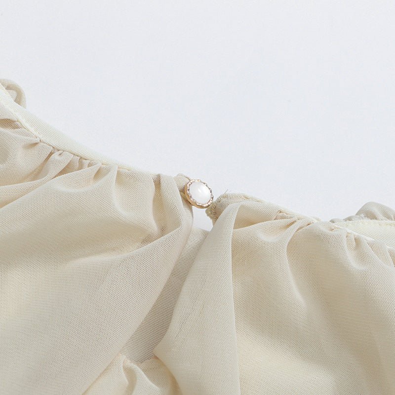 Full-length front view of lantern sleeve modest dress