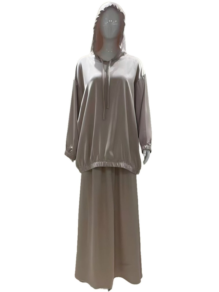 Model wearing satin co-ord set in a relaxed, modest everyday outfit