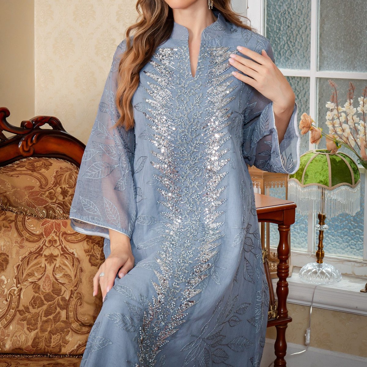 Sequin mesh modest gown with three-quarter sleeves and elegant silhouette