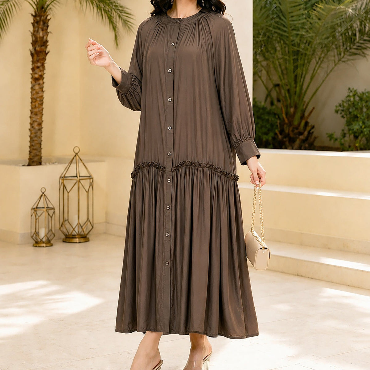 Close-up of adjustable waist tie on modest flared abaya dress