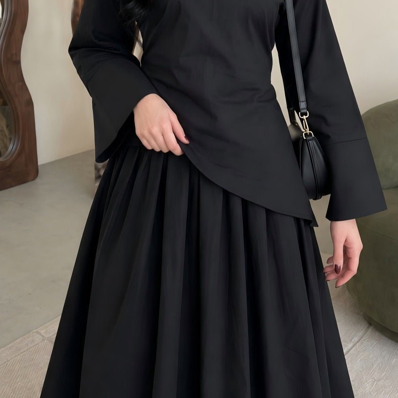 Full-length monochrome two-piece set styled with coordinated hijab