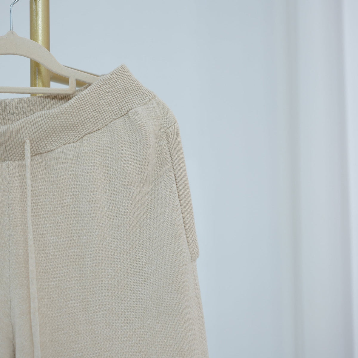 Belt detail on coordinating longline cardigan