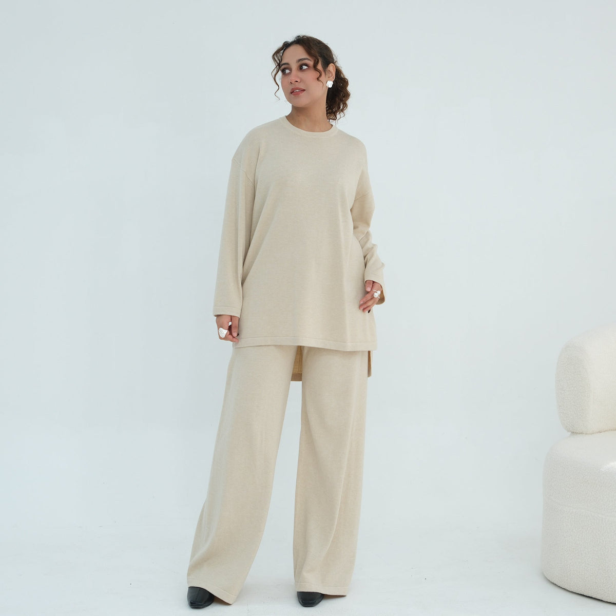 Styled look featuring cardigan open over knit set