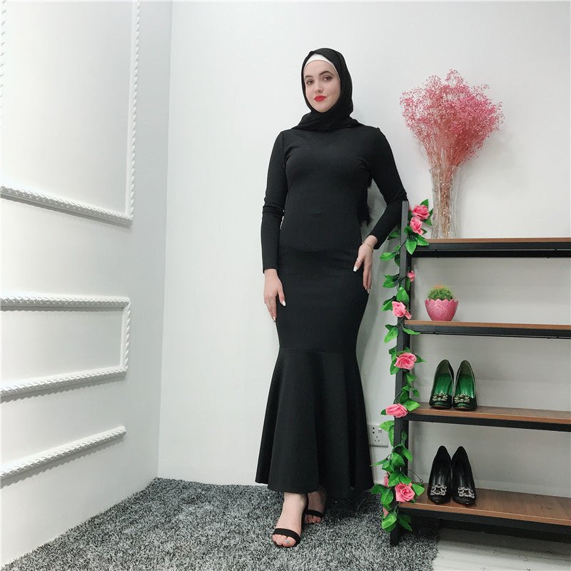 Front view of four-way stretch mermaid hem maxi dress with long fitted sleeves