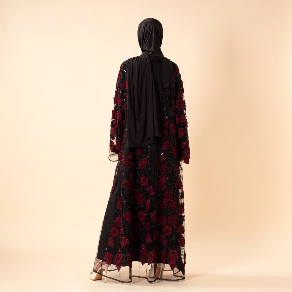 Sheer overlay and hand-laid cord detailing on couture bridal abaya