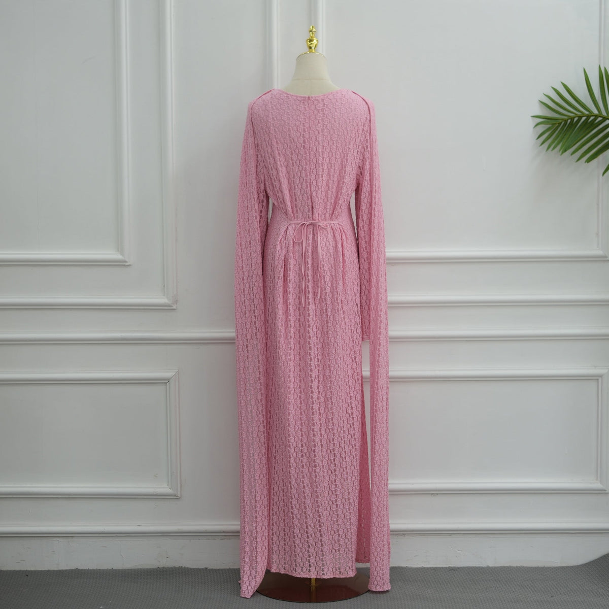 Close-up of floor-trailing hem on the fully lined modest dress