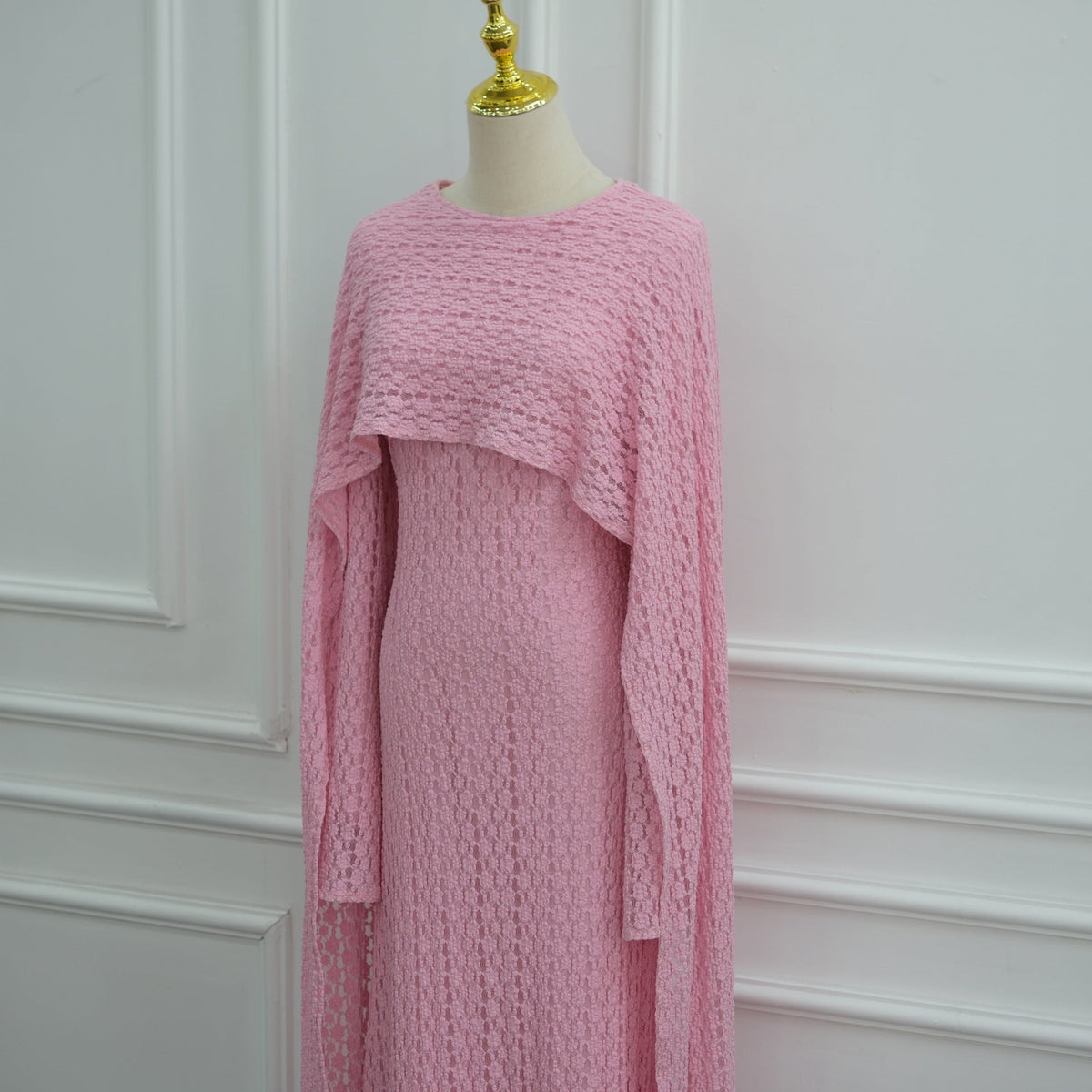 Modest bridal guest look in floral lace cape-sleeve maxi dress