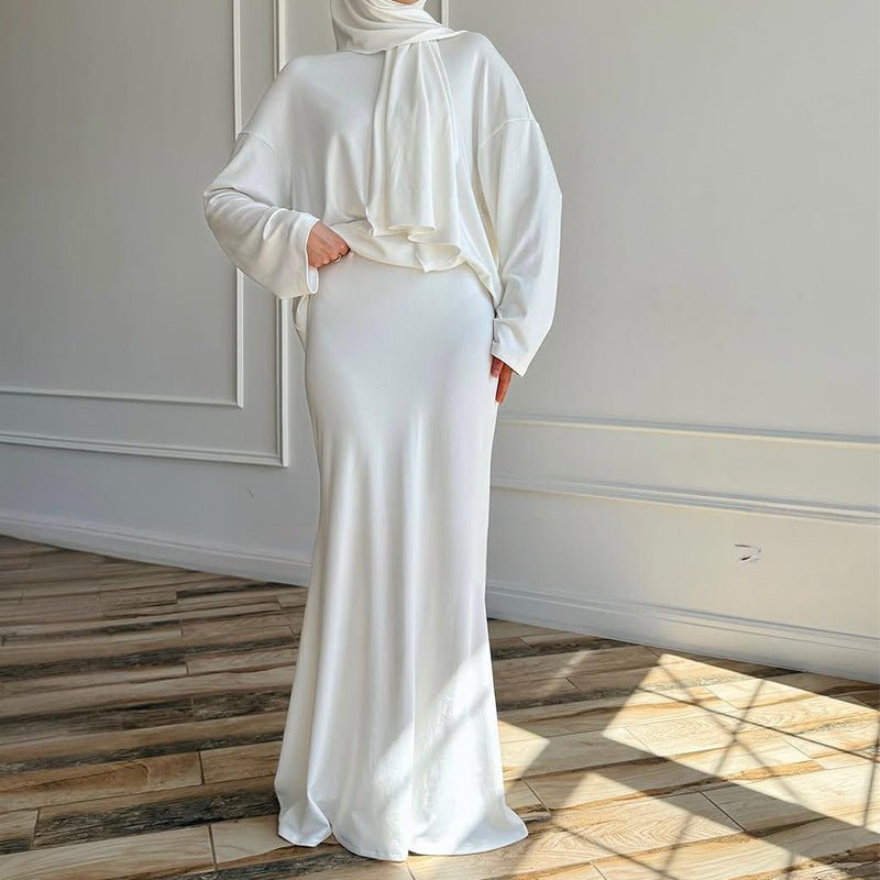Black modest outfit with attached hijab and flattering silhouette