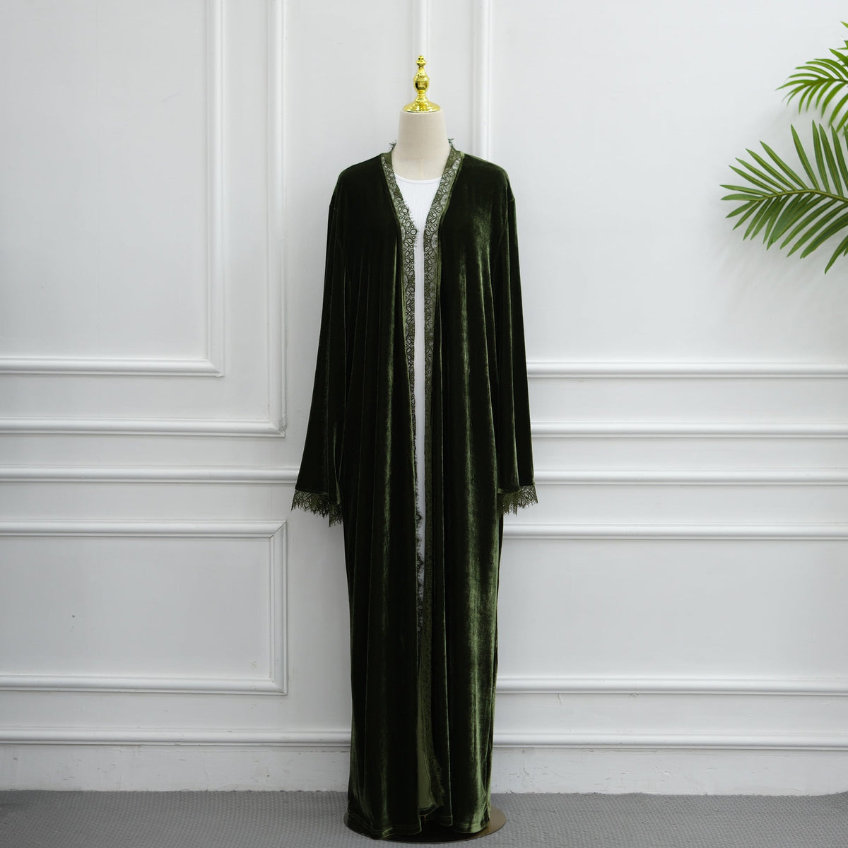 Longline velvet abaya styled with hijab for formal evening look